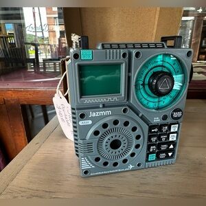 Jazamm. Portable band radio